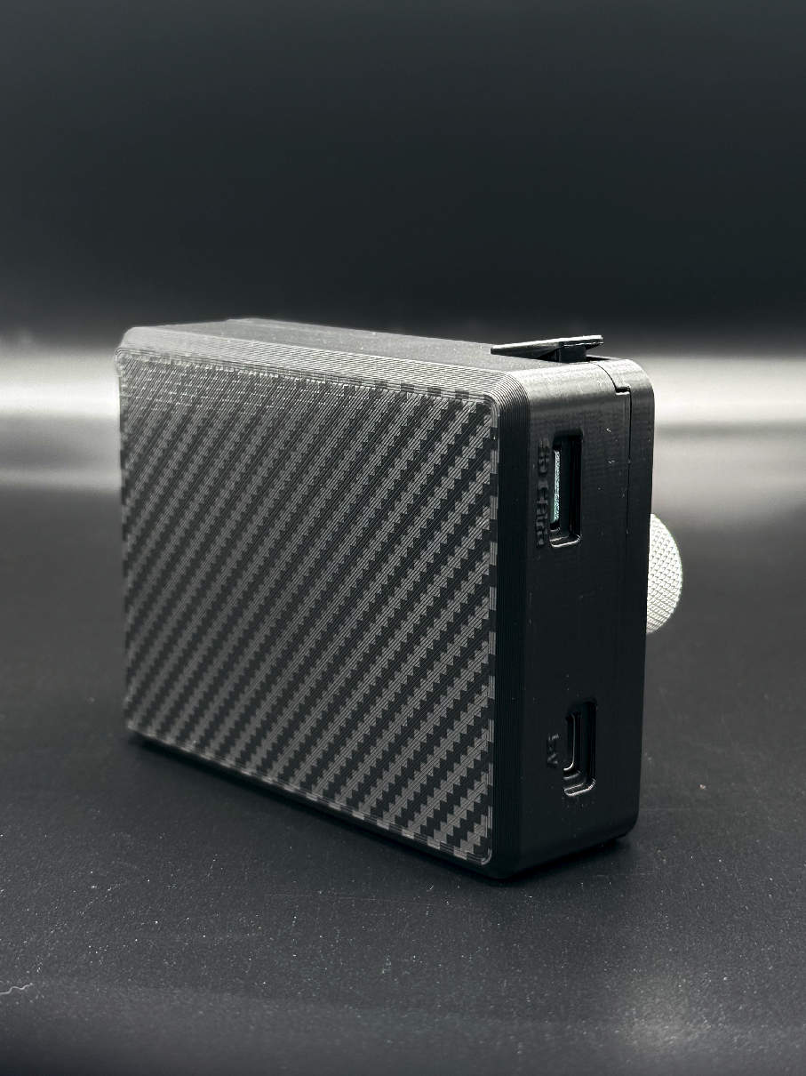 Side of the VMod Pro voice modulator with its labelled microSD card slot and USB-C charging port